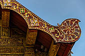 Chiang Mai - The Wat Phra Singh temple. The ubosot (ordination hall), detail of the roof finial. 